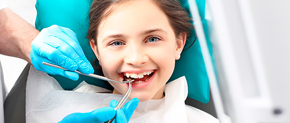 The Smile Workx - Dental Services - Preventive Children Dentistry Smiling Girl
