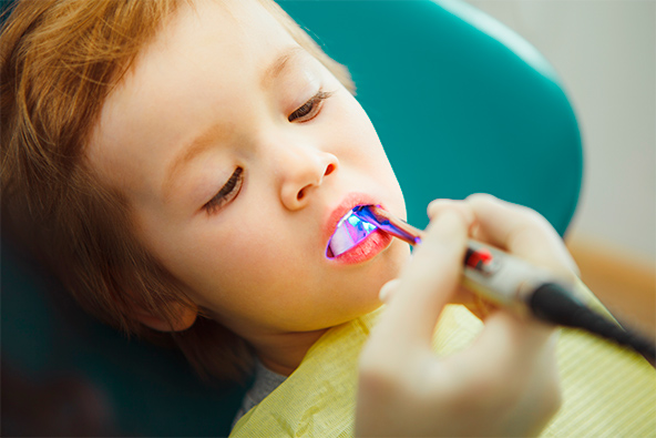child in dentist chair