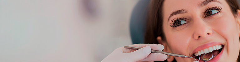 woman smiling at dentist
