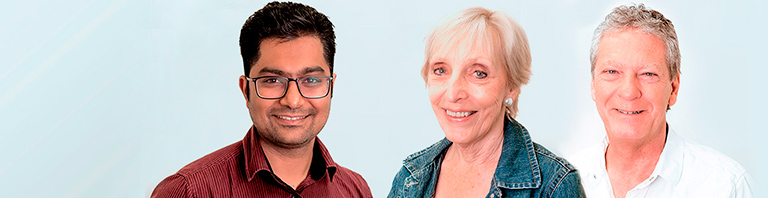 three dentists smiling