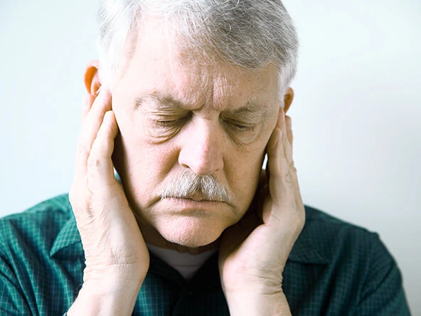 The Smile Workx - Dental Services - TMJ Sleep Apnoea Treatments Old Man Covering His Ears